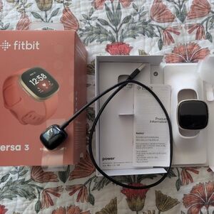 Fitbit Versa 3 With Several Wristbands